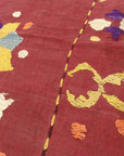 Antique Uzbek Turkestan Wool and Silk Suzani. A piece of wool and silk woven art sold by Santa Barbara Design Center Rugs and More in Santa Barbara CA.