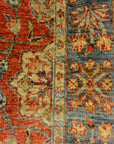 Fine Mughal Runner hand knotted of fine wool and organic dyes. Featuring reds and blues.