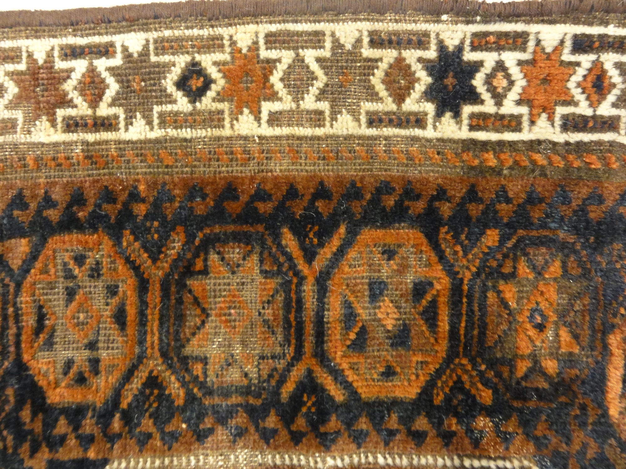 Antique Baluch Bagface. Rugs & More in the Santa Barbara Design Center. This Antique Baluch Bagface is a beauty, unique, and a treasure to be found.