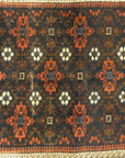 An antique and original burial Baluch dated rug. Dated on all four corners. Used as a casket covering. Sold by Santa Barbara Design Center.