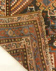 Antique Persian Khamseh Chicken Rug. A piece of genuine woven carpet art sold by Santa Barbara Design Center Rugs and More.
