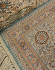 An antique finest silk rug featuring the garden of paradise with 1001 flowers. A piece of genuine woven carpet art sold at Santa Barbara Design Center.