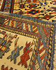 Antique Rare Gold Kuba Chichi Rug. A genuine authentic antique piece of carpet art sold by the Santa Barbara Design Center, Rugs and More.