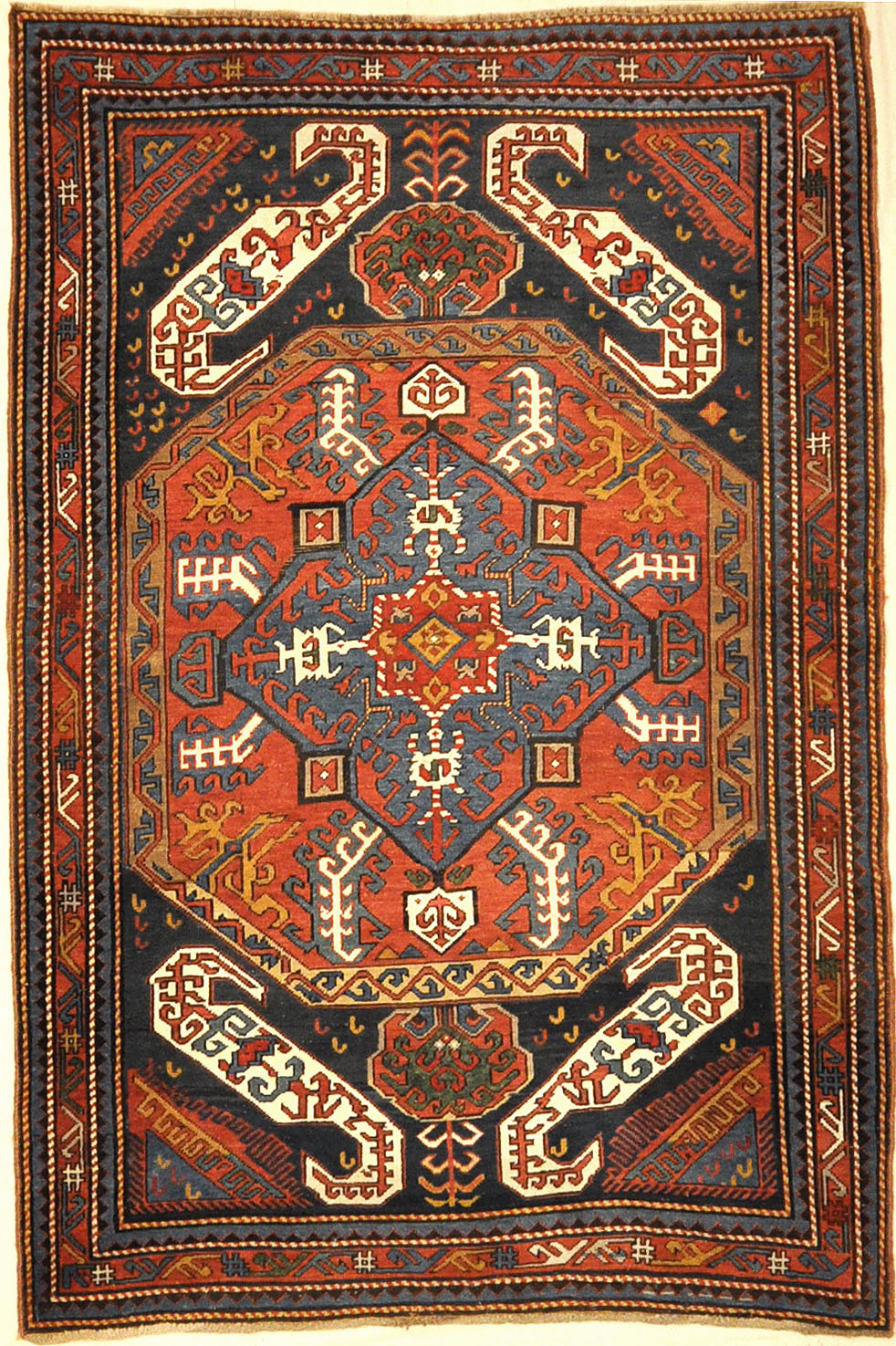 Antique Kazak Kasim Oushak ca 1875. A piece of genuine authentic antique woven carpet art sold by the Santa Barbara Design Center, Rugs and More.