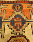 Rare Antique Leshgi Star Rug featuring Men Standing on Horses. A piece of genuine antique authentic woven carpet art sold by Santa Barbara Design Center.