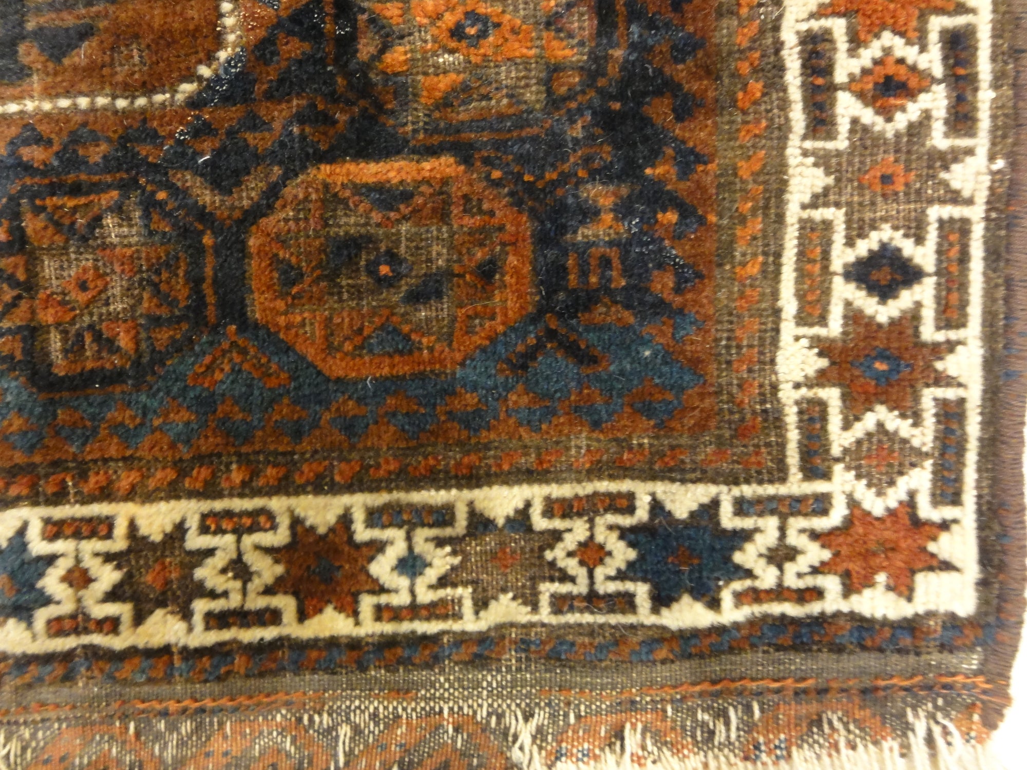 Antique Baluch Bagface. Rugs & More in the Santa Barbara Design Center. This Antique Baluch Bagface is a beauty, unique, and a treasure to be found.