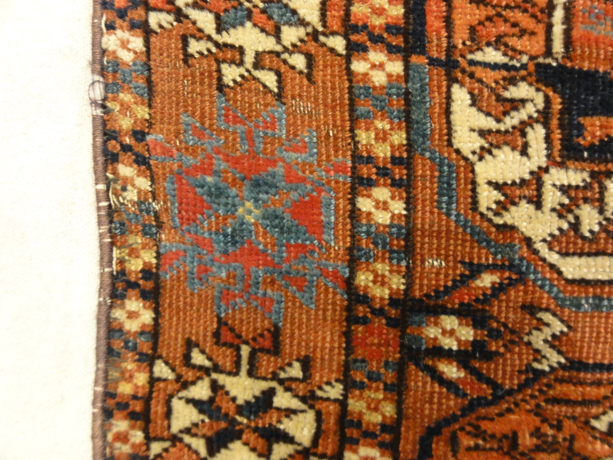 Fine Antique Tekke Bukhara Rug. A piece of genuine authentic woven carpet art sold by the Santa Barbara Design Center Rugs and More.