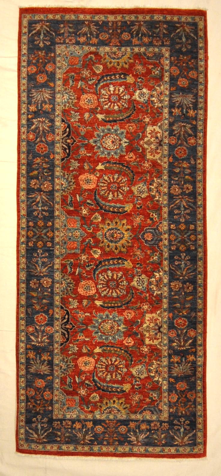 Fine Mughal Runner hand knotted of fine wool and organic dyes. These are the perfect colors to incorporate into your home.