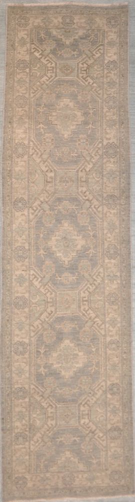 This Khotan Runner is made of natural dyes and handspan wool. This beautiful creation is modeled after an 18th c. piece that carries different cultural influences from the city of Khotan.