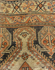 Antique Persian Qashqai featuring Tribal Flowers. A piece of genuine handwoven carpet art sold by Santa Barbara Design Center Rugs and More.