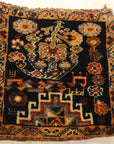 Antique Qashqai Chanteh Women's Bag. A piece of antique woven carpet art sold by Santa Barbara Design Center, Rugs and More in Santa Barbara, California.