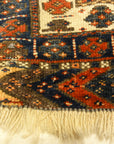 Kurdish Bagface Jaf Kurd. A genuine, antique piece of woven carpet art sold by Rugs & More in the Santa Barbara Design Center.