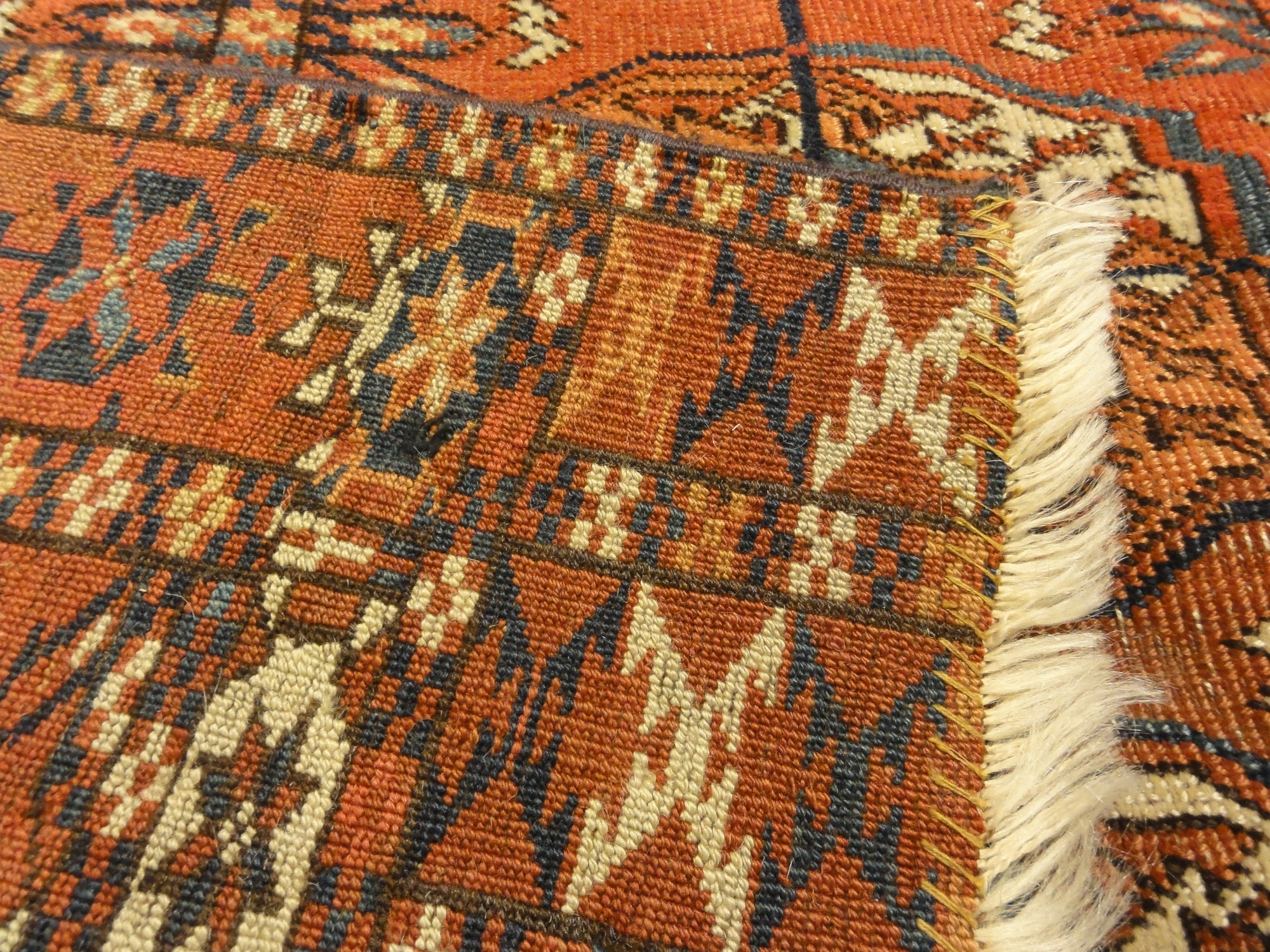 Fine Antique Tekke Bukhara Rug. A piece of genuine authentic woven carpet art sold by the Santa Barbara Design Center Rugs and More.