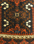 An antique and original burial Baluch dated rug. Dated on all four corners. Used as a casket covering. Sold by Santa Barbara Design Center.