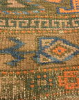 An antique original Mushwani Baluch rug handwoven in Afghanistan. A piece of genuine, authentic woven carpet art. Sold by Santa Barbara Design Center.
