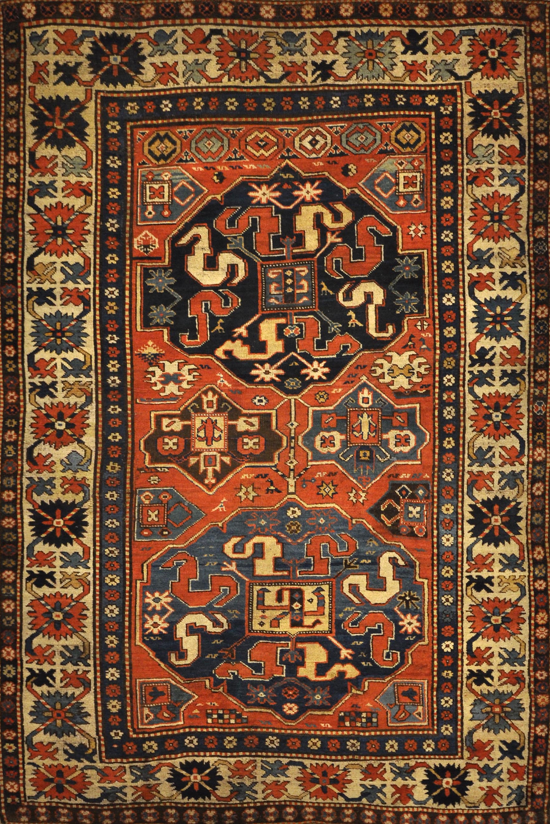 Antique Rare Cloudband Caucasian Chondzoresk Rug. A piece of genuine authentic antique woven carpet art sold by Santa Barbara Design Center Rugs More.