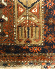 An antique, original Persian Baluch rug. A piece of genuine and authentic carpet art sold at Santa Barbara Design Center. Rugs and More.