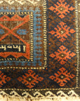 An antique and original burial Baluch dated rug. Dated on all four corners. Used as a casket covering. Sold by Santa Barbara Design Center.