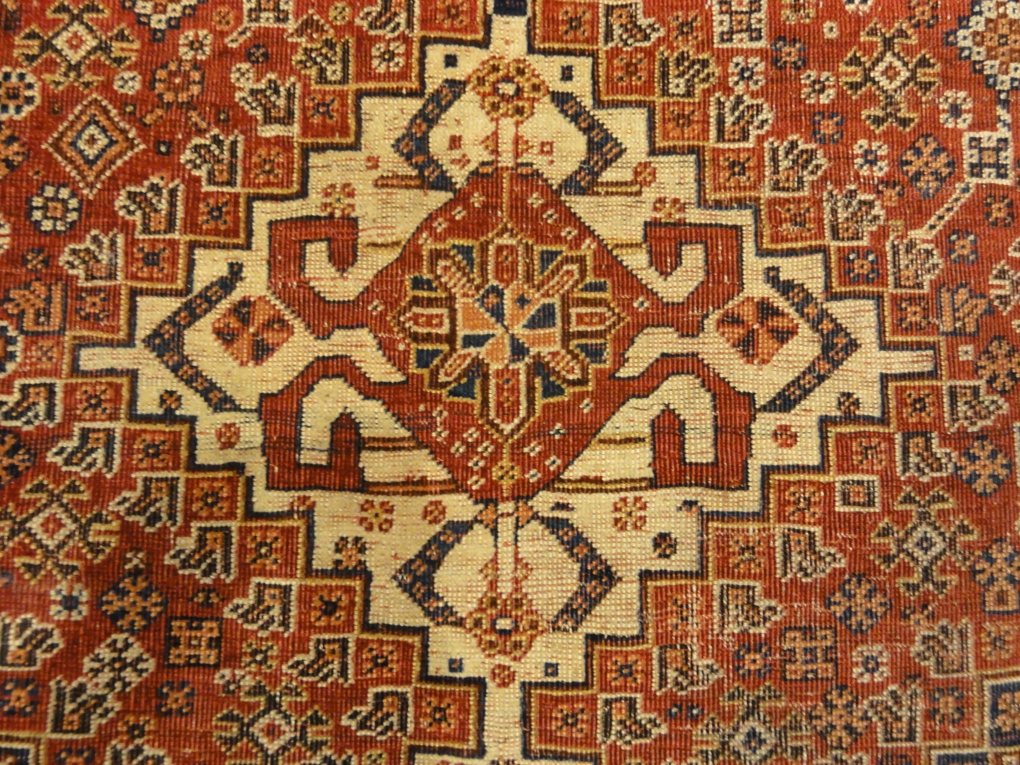Antique Persian Qashqai Rug. A piece of genuine woven carpet art sold by the Santa Barbara Design Center, Rugs and More in Santa Barbara, California.