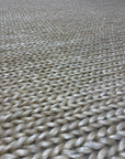 Close-up of the intricate woven pattern of a Ziegler & Co. Modern Rug, highlighting its texture and craftsmanship.
