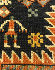 Antique Shirvan Rug Featuring Peacock and Two Men. A genuine authentic antique piece of woven carpet art sold by Santa Barbara Design Center, Rugs and More.