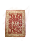 A beautiful vintage 11' x 14' Oushak carpet, woven with organic dyes and hand spun wool. Larger allover design Oushaks tend to be a favorite of top designers, with their uplifting colors and somewhat tribal approach to floral motifs, they instantly transform and elevate any space.