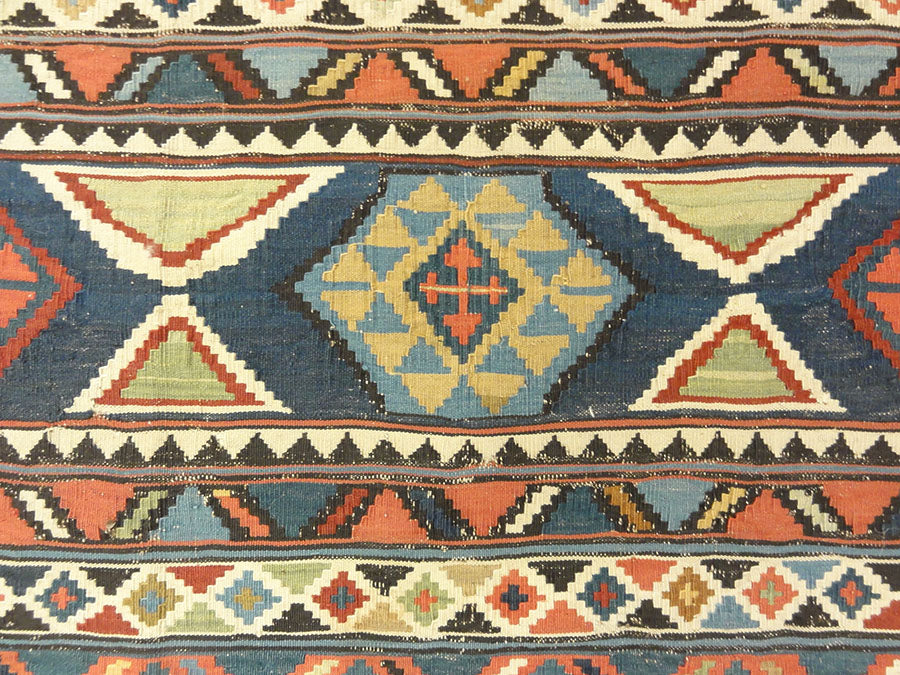 Antique Fine Shirvan Rug. A piece of genuine antique woven carpet art sold by Santa Barbara Design Center, Rugs and More in Santa Barbara, California.