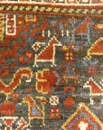 Antique Persian Khamseh Chicken Rug. A piece of genuine woven carpet art sold by Santa Barbara Design Center Rugs and More.