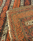 Antique Original Afghan Beluch circa 1880. A piece of genuine woven carpet art sold at the Santa Barbara Design Center Rugs and More in Santa Barbara, CA.
