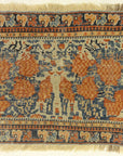 Antique Khamseh with Tribal Flowers. A piece of genuine woven carpet art sold at the Santa Barbara Design Center Rugs and More in Santa Barbara California.
