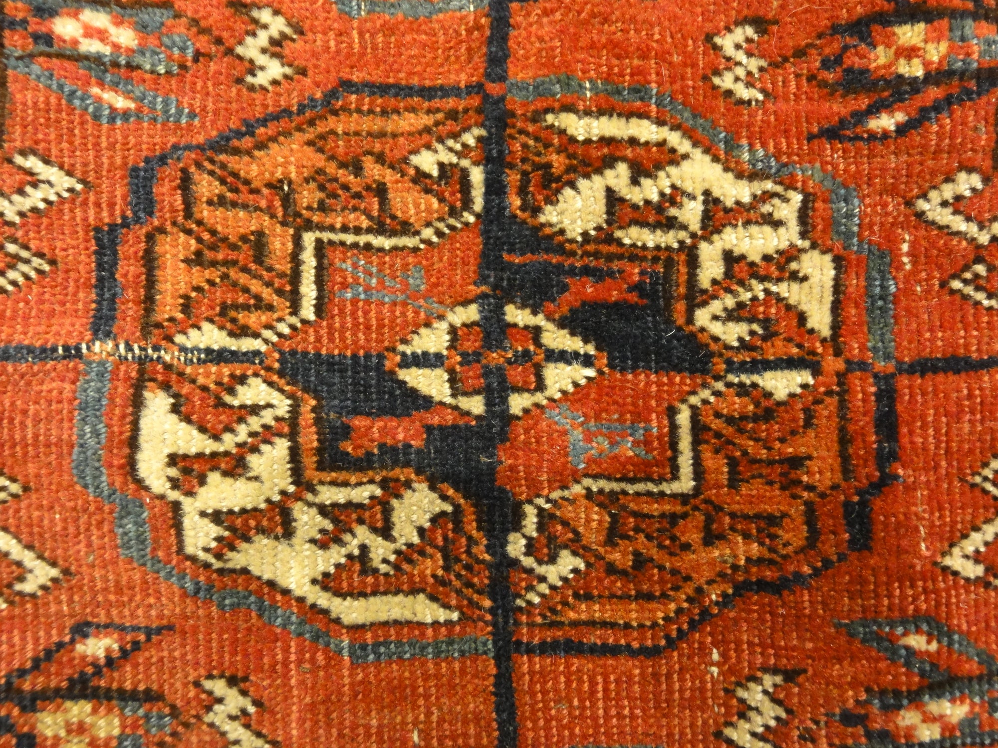 Fine Antique Tekke Bukhara Rug. A piece of genuine authentic woven carpet art sold by the Santa Barbara Design Center Rugs and More.