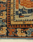 Antique Khamseh with Tribal Flowers. A piece of genuine woven carpet art sold at the Santa Barbara Design Center Rugs and More in Santa Barbara California.