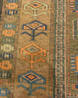 An antique original Mushwani Baluch rug handwoven in Afghanistan. A piece of genuine, authentic woven carpet art. Sold by Santa Barbara Design Center.