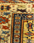 Antique Rare Gold Kuba Chichi Rug. A genuine authentic antique piece of carpet art sold by the Santa Barbara Design Center, Rugs and More.