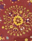 Antique Uzbek Turkestan Wool and Silk Suzani. A piece of wool and silk woven art sold by Santa Barbara Design Center Rugs and More in Santa Barbara CA.