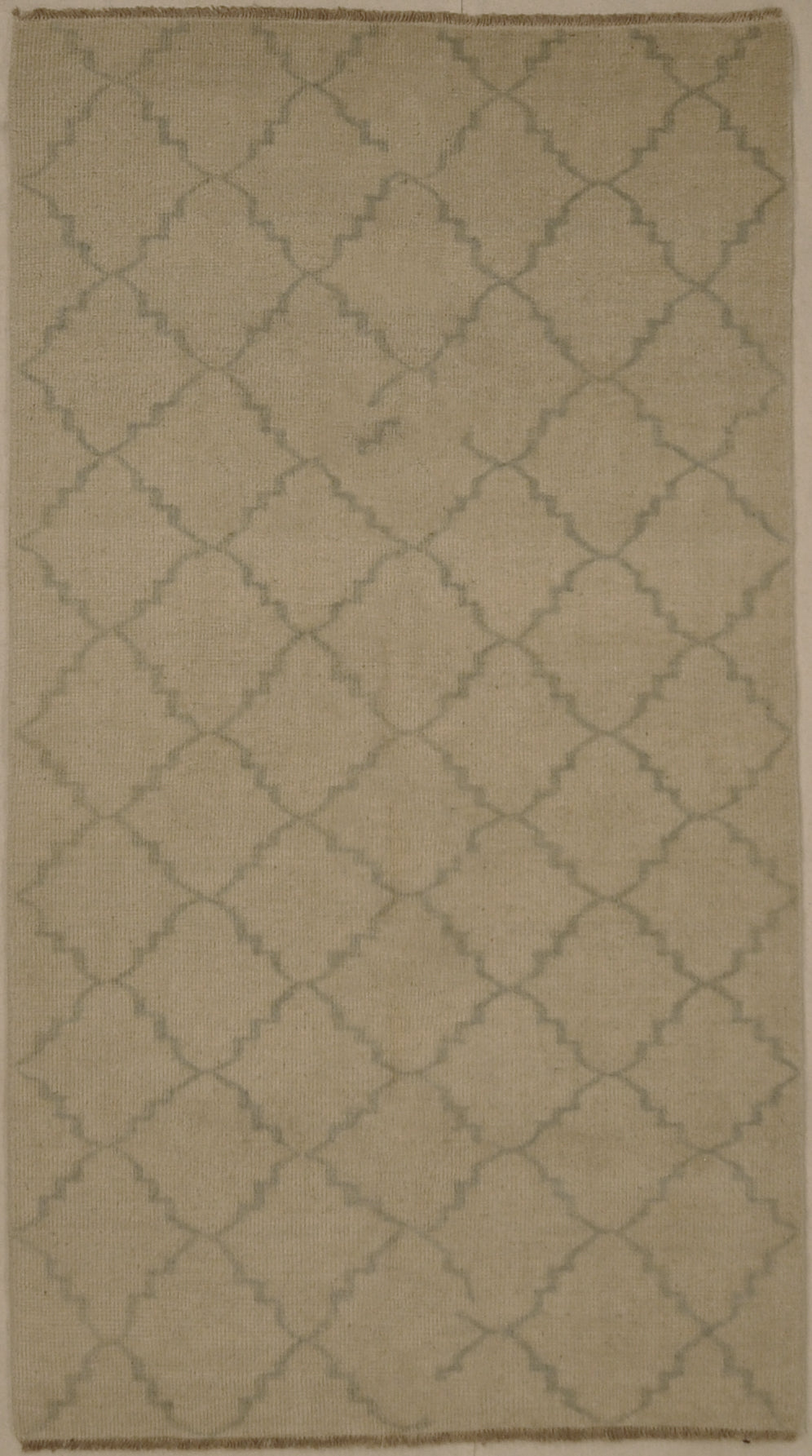 Blue and Beige Modern Trellised Rug. A piece of genuine woven carpet art sold by the Santa Barbara Design Center, Rugs and More.