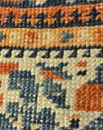 Antique Khamseh with Tribal Flowers. A piece of genuine woven carpet art sold at the Santa Barbara Design Center Rugs and More in Santa Barbara California.