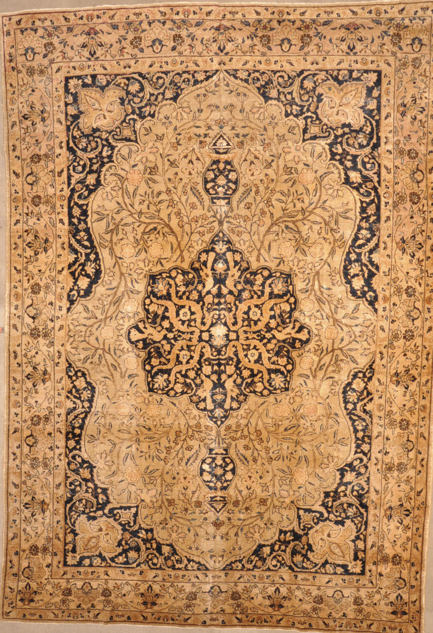 Antique Tabriz rugs are distinguished by their excellent weave and by their remarkable adherence to the classical traditions of antique Persian rug design.