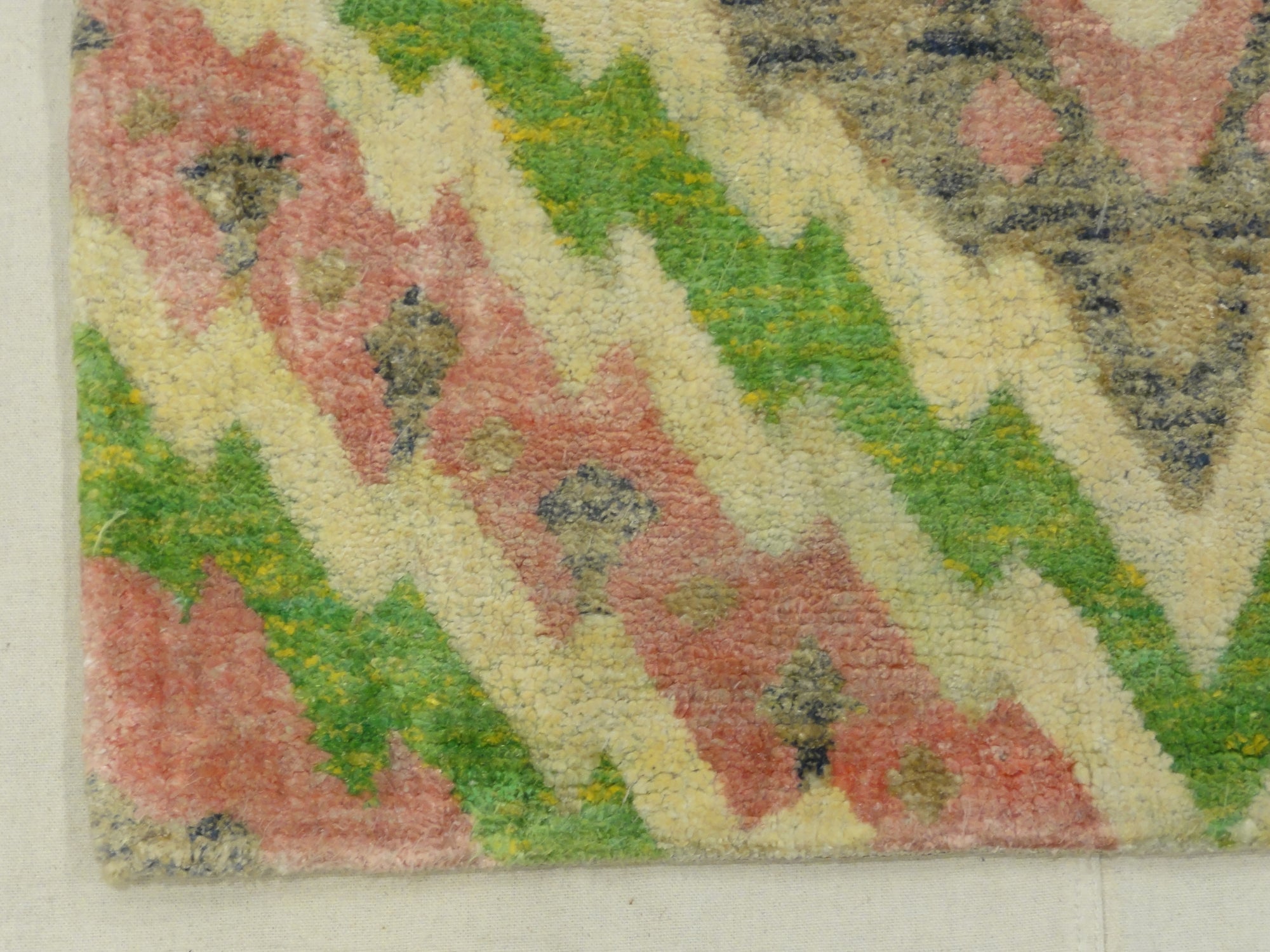 Lovely Patterned Green and Pink Runner. A piece of genuine woven authentic carpet art sold by Santa Barbara Design Center, Rugs and More.