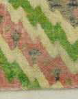 Lovely Patterned Green and Pink Runner. A piece of genuine woven authentic carpet art sold by Santa Barbara Design Center, Rugs and More.