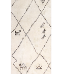 Santa Barbara Chic Moroccan rug with geometric diamond patterns and abstract black line designs on a white background.