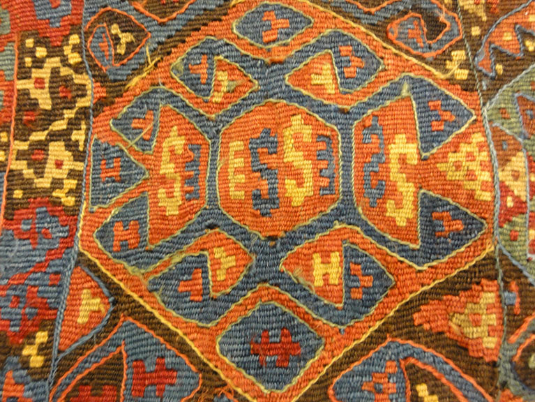Small Bakhetiari Kelim Saddle Bag some metal threading throughout. Visit us Rugs & More in the Santa Barbara Design Center.