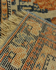 Antique Khamseh with Tribal Flowers. A piece of genuine woven carpet art sold at the Santa Barbara Design Center Rugs and More in Santa Barbara California.