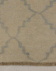 Blue and Beige Modern Trellised Rug. A piece of genuine woven carpet art sold by the Santa Barbara Design Center, Rugs and More.