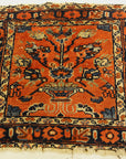 Antique Persian Malayar Vase of Flowers Bagface. A piece of genuine authentic antique woven carpet art sold by the Santa Barbara Design Center Rugs and More