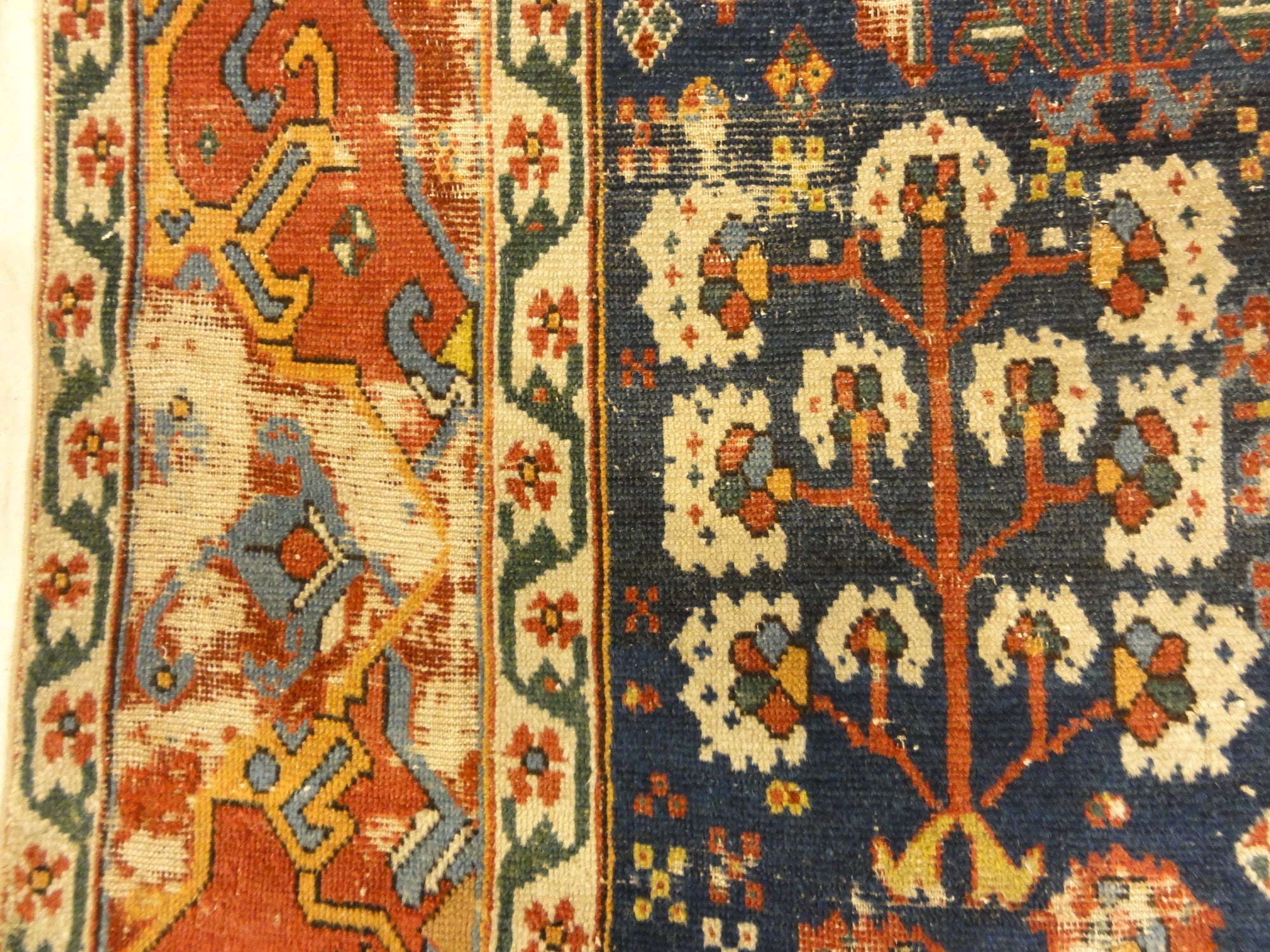 Antique Kurdish Shrub Rug Circa 17th Century A piece of genuine authentic woven carpet art sold by Santa Barbara Design Center Rugs and More.